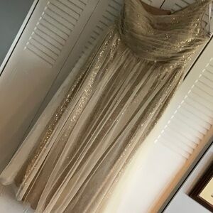 Used once for event. Minimal alteration in chest. Fits more like 20